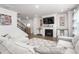 Spacious living room with fireplace and staircase, great for entertaining guests at 1415 Dalton Pl, Mebane, NC 27302