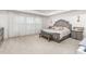 Inviting main bedroom with a plush bed, neutral palette, and ample natural light offering a serene ambiance at 1415 Dalton Pl, Mebane, NC 27302