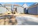 Home boasts a concrete patio and a newly landscaped backyard, offering space for outdoor activities and relaxation at 146 Weavers Grove Dr, Chapel Hill, NC 27514