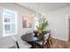 Bright dining room features an elegant chandelier and a modern, oval-shaped dining table with seating for six at 146 Weavers Grove Dr, Chapel Hill, NC 27514