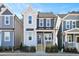Charming two-story home featuring a covered porch, complemented by varied exterior finishes and landscaping at 146 Weavers Grove Dr, Chapel Hill, NC 27514