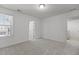 A bright, carpeted bedroom with white walls and natural light from the window at 150 Alamosa Pl, Cary, NC 27519