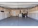 A clean garage with epoxy flooring, perfect for storage and parking at 150 Alamosa Pl, Cary, NC 27519