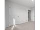 This carpeted bedroom features two closets and an open doorway at 200 Olive Branch St, Sanford, NC 27332