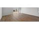 Open living room with vinyl floors and sliding glass doors for natural light and easy outdoor access at 200 Olive Branch St, Sanford, NC 27332