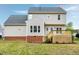 Exterior of house showing newly constructed deck with stairs and mature landscaping at 2020 Battlewood Rd, Apex, NC 27523