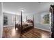 Bedroom with hardwood floors, natural light, and window views at 206 Herronwood Dr, Graham, NC 27253