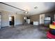 Spacious garage interior showing ample storage space and access doors to the house at 206 Herronwood Dr, Graham, NC 27253