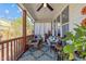 Cozy porch features comfortable seating, wood accents, and a relaxing atmosphere at 207 Grand Ave, Raleigh, NC 27606