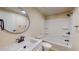 Bathroom with a round mirror, shower, and bathtub at 210 Holloway Rd, Roxboro, NC 27573