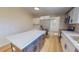 Kitchen featuring an island with white countertops and stainless steel appliances at 210 Holloway Rd, Roxboro, NC 27573