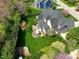 Stunning aerial view of a home featuring a large, well-manicured backyard and inviting patio space at 213 Billingrath Turn Ln, Cary, NC 27519