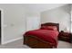 Bedroom featuring carpet, neutral paint, and traditional wood furniture with a double-door closet at 213 Billingrath Turn Ln, Cary, NC 27519
