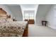 Spacious bedroom features bed with patterned bedding, dresser, side tables, and windows for natural light at 213 Billingrath Turn Ln, Cary, NC 27519