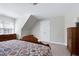 Bedroom featuring neutral walls, carpeted floors, with wooden furniture and a window at 213 Billingrath Turn Ln, Cary, NC 27519