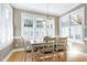 Cozy dining area with plantation shutters for privacy and lots of natural light at 213 Billingrath Turn Ln, Cary, NC 27519