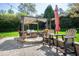 Charming pergola with outdoor seating, creating a relaxing and inviting space in the backyard at 213 Billingrath Turn Ln, Cary, NC 27519