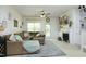 Comfortable living room with plush sofa, fireplace, and natural light at 2133 Persimmon Ridge Dr, Raleigh, NC 27604