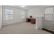 Spacious bedroom with ample natural light and a traditional wooden desk at 219 Begen St, Morrisville, NC 27560