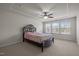 Bedroom with tray ceiling, ceiling fan and natural light at 219 Begen St, Morrisville, NC 27560