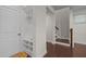 Entryway with coat rack, built-in storage, and stairs to the second level at 219 Begen St, Morrisville, NC 27560