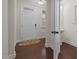 Welcoming entryway with a white front door, hardwood floors, and a convenient sink area at 219 Begen St, Morrisville, NC 27560