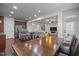 Open concept living space with kitchen, dining area, and a living room at 219 Begen St, Morrisville, NC 27560