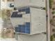 Aerial view showcasing solar panels installed on the roof of a house with surrounding neighborhood at 219 Begen St, Morrisville, NC 27560