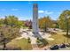 An aerial view of a Bell Tower surrounded by buildings, lawn and parking at 2306 Stafford Ave # A, Raleigh, NC 27607