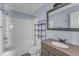 Bathroom featuring modern fixtures, including updated countertop and shower-tub at 2306 Stafford Ave # A, Raleigh, NC 27607