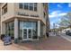 Exterior of Tupelo Honey Southern Kitchen & Bar with large windows and outdoor seating visible at 2306 Stafford Ave # A, Raleigh, NC 27607