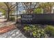 Landscaping around the Village District sign with vibrant colors at 2306 Stafford Ave # A, Raleigh, NC 27607