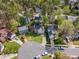 An aerial view showing the mature trees and landscaping of this neighborhood with well maintained lawns at 2340 Florida Ct, Raleigh, NC 27615