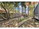Stone walkway leading to outdoor seating in private backyard at 2340 Florida Ct, Raleigh, NC 27615