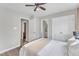 Bright bedroom with a ceiling fan and ensuite bathrooms nearby at 2340 Florida Ct, Raleigh, NC 27615
