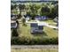 An aerial view showcasing the home's location within a serene residential community with lush surroundings at 236 Summer Place Ct, Clayton, NC 27527