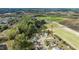 An aerial view highlighting the home's prime location, nestled amongst verdant greenery and close to local amenities at 236 Summer Place Ct, Clayton, NC 27527