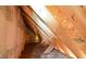Partially finished attic space with exposed beams and insulation, offering potential for storage at 236 Summer Place Ct, Clayton, NC 27527