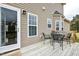 Inviting back deck with outdoor seating, ideal for entertaining and enjoying the outdoors at 236 Summer Place Ct, Clayton, NC 27527