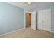 Spacious bedroom with closet access and light-filled entryway at 236 Summer Place Ct, Clayton, NC 27527