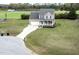 Charming two-story home with a well-maintained lawn, a two-car garage and a cozy front porch at 236 Summer Place Ct, Clayton, NC 27527