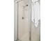 Enclosed stand-up shower featuring a chrome shower head and glass door at 236 Summer Place Ct, Clayton, NC 27527