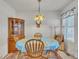 Bright dining room featuring vintage light fixture and decor at 24 High Standard Ln, Angier, NC 27501