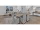 Dining room and living room with lots of natural light that is perfect for Gathering gatherings at 242 Luftee Ln, Holly Springs, NC 27540
