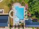 Aerial view of the community pool, a perfect place for relaxation and summer fun at 242 Luftee Ln, Holly Springs, NC 27540