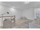 Bright sitting area with plush armchairs, a side table, and a scenic view at 242 Luftee Ln, Holly Springs, NC 27540
