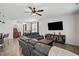 Comfortable living area with leather seating, a wooden coffee table, and a modern entertainment unit at 250 Hawksbill Dr, Franklinton, NC 27525