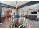 The home's open concept features a dining room, living room, and kitchen that flow into one another seamlessly at 250 Hawksbill Dr, Franklinton, NC 27525