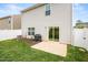 This backyard features a patio, grill, and sliding glass door at 2512 Lily Dr, Haw River, NC 27258