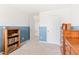 Inviting bedroom with warm colors, featuring a bookshelf and dresser for an organized and cozy space at 2512 Lily Dr, Haw River, NC 27258